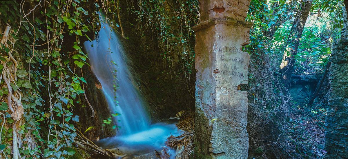 Waterfall in Spanish ruins