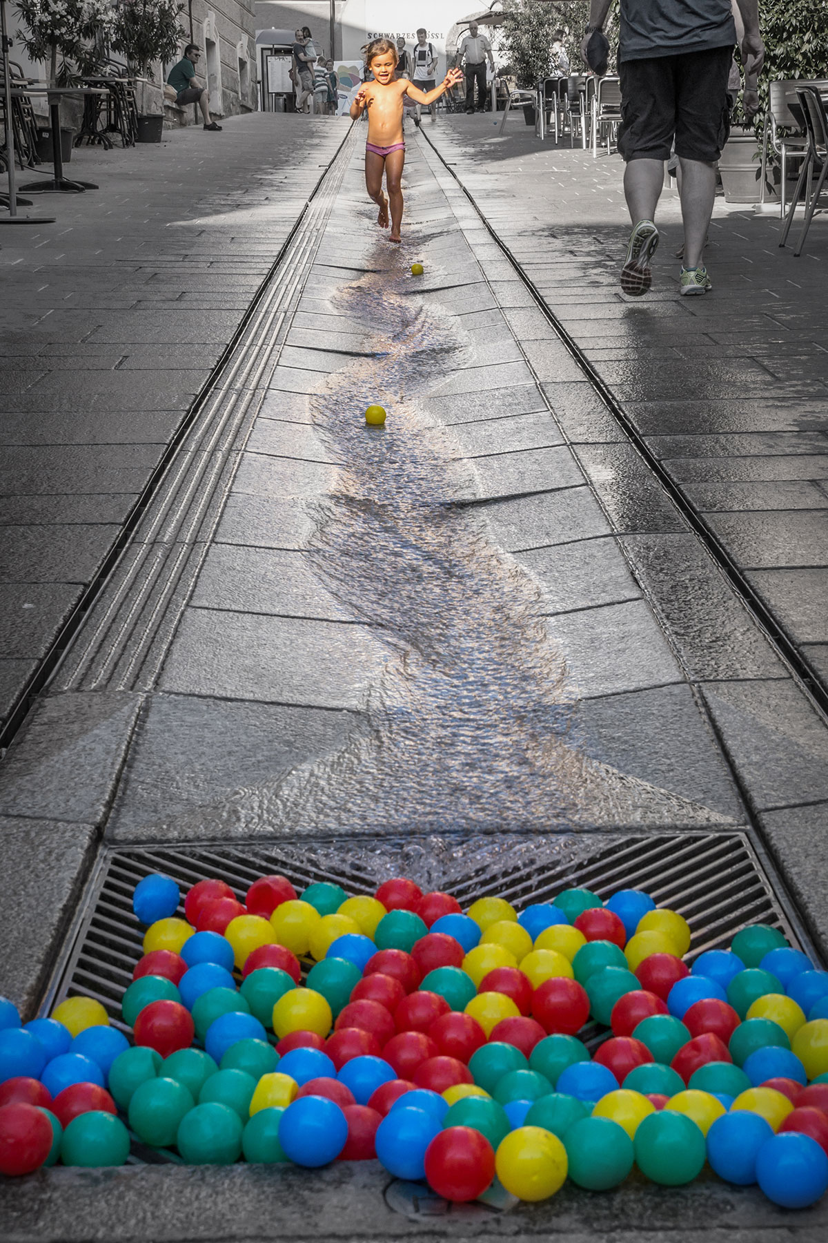 Kids playing water and balls, Salzburg, Austria