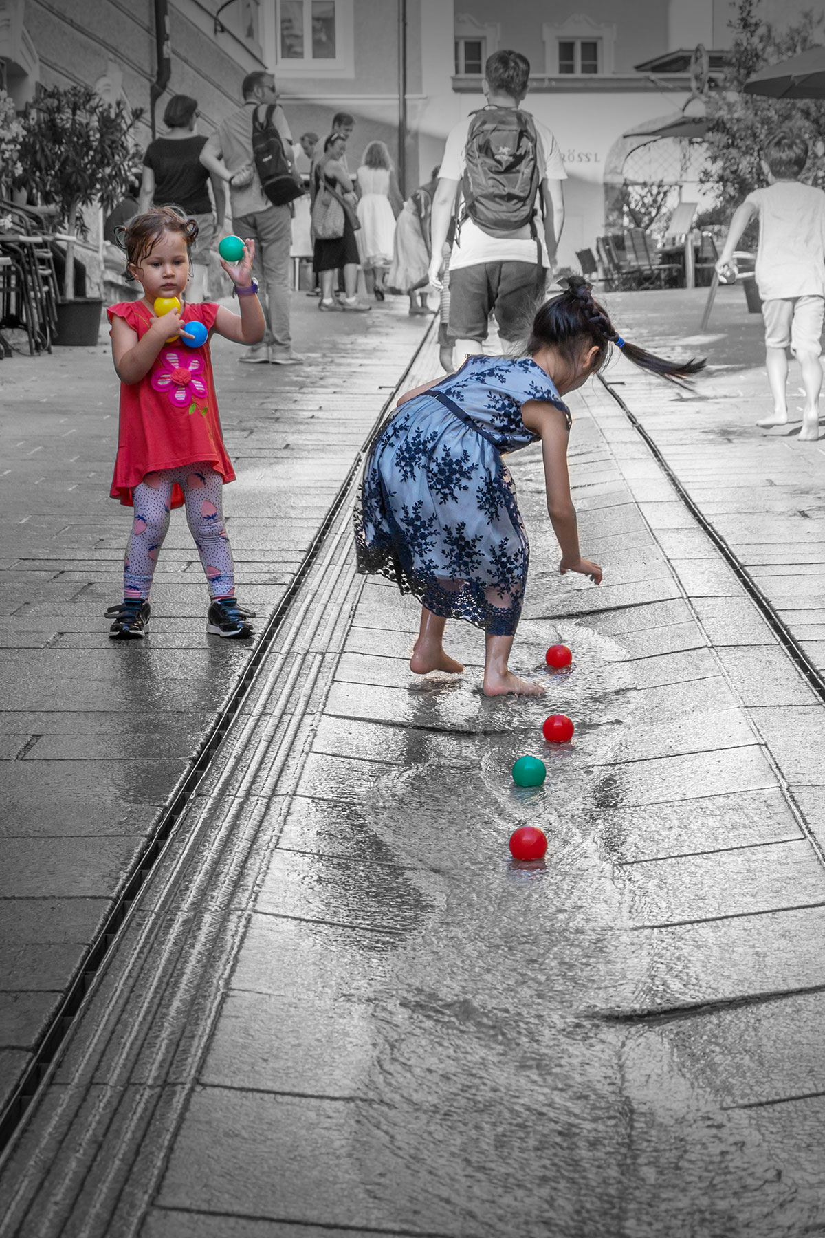 Kids playing water and balls, Salzburg, Austria